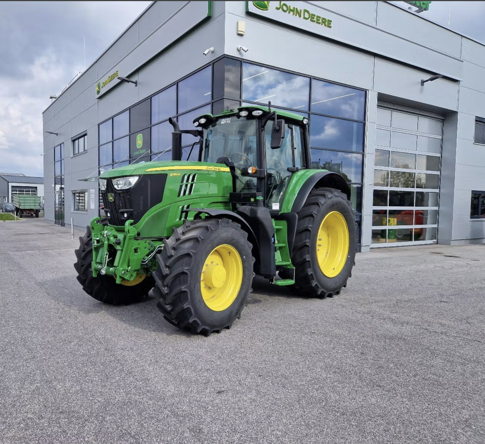 John Deere 6195M tractor