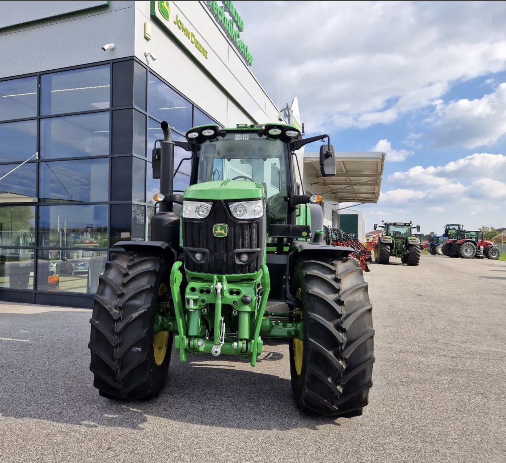 John Deere 6195M tractor