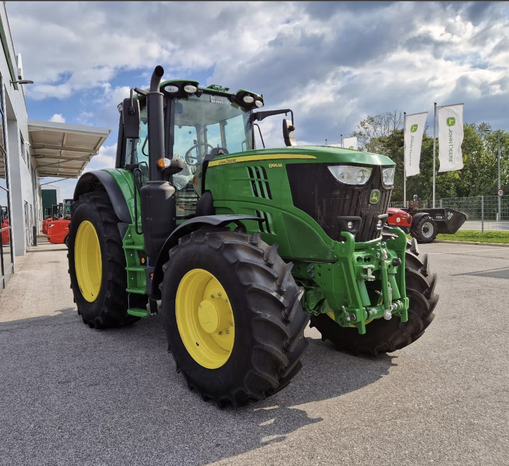 John Deere 6195M tractor