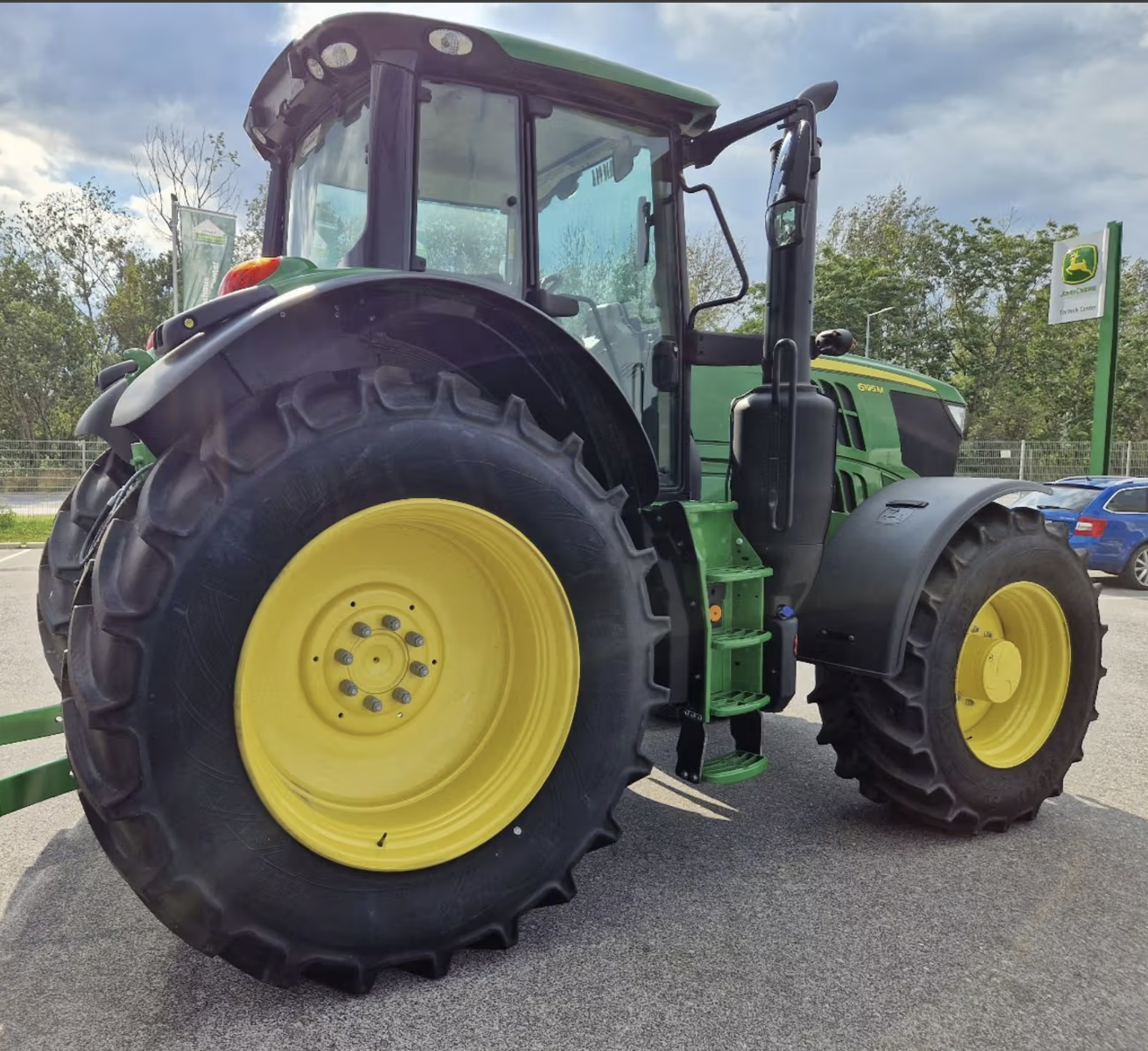 John Deere 6195M tractor