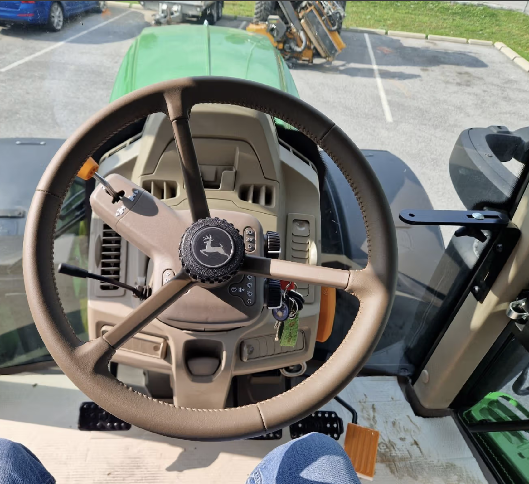 John Deere 6195M tractor
